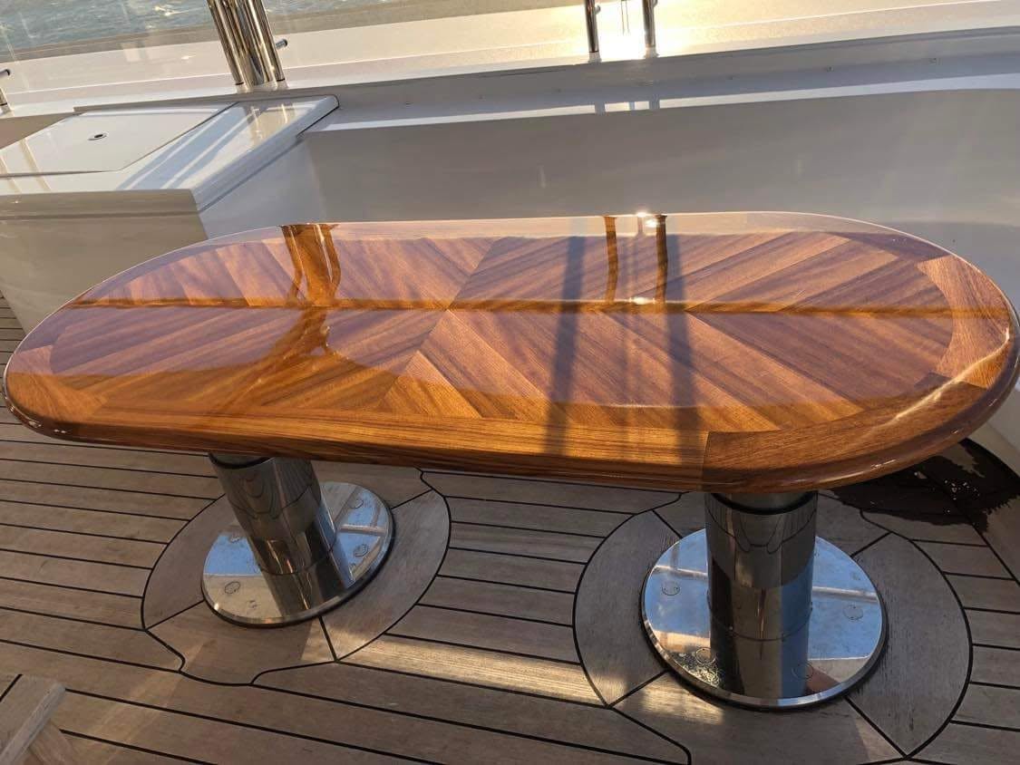 High-gloss chevron teak table