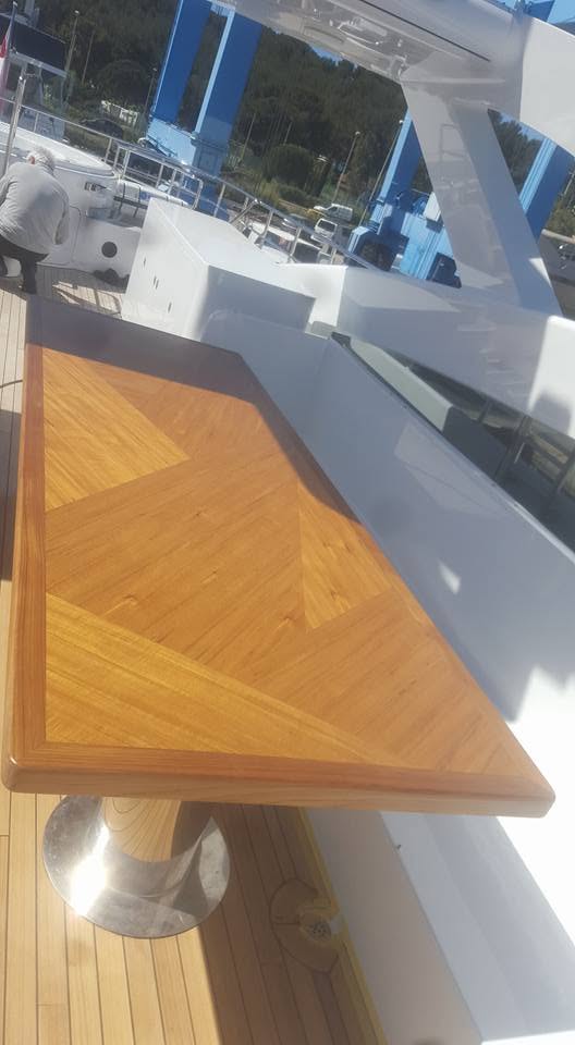 Extending marquetry deck table