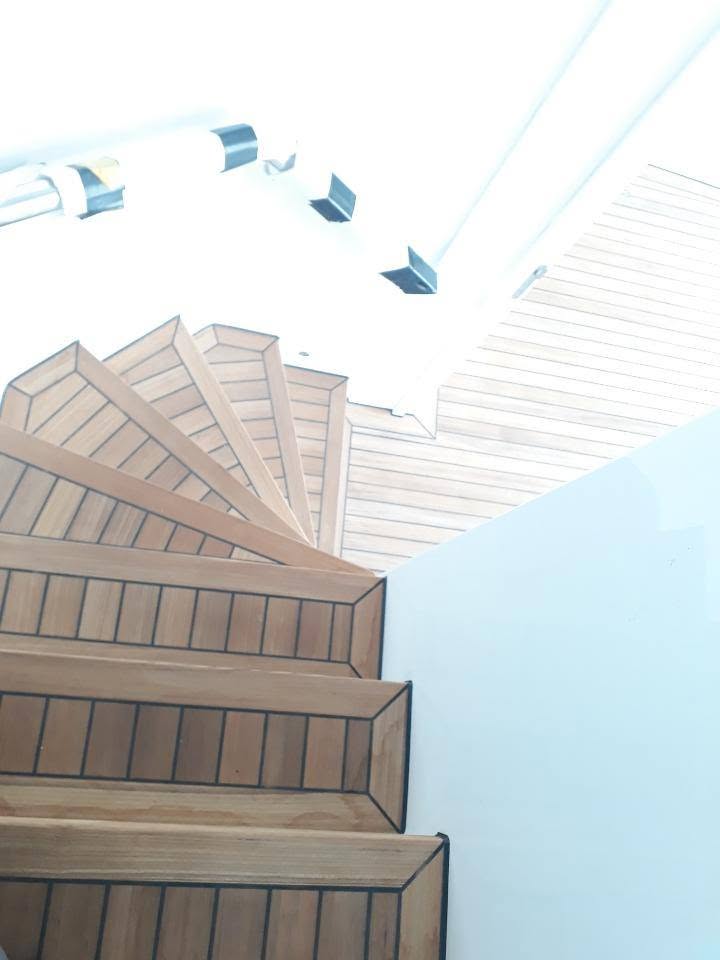 Spiral teak companionway