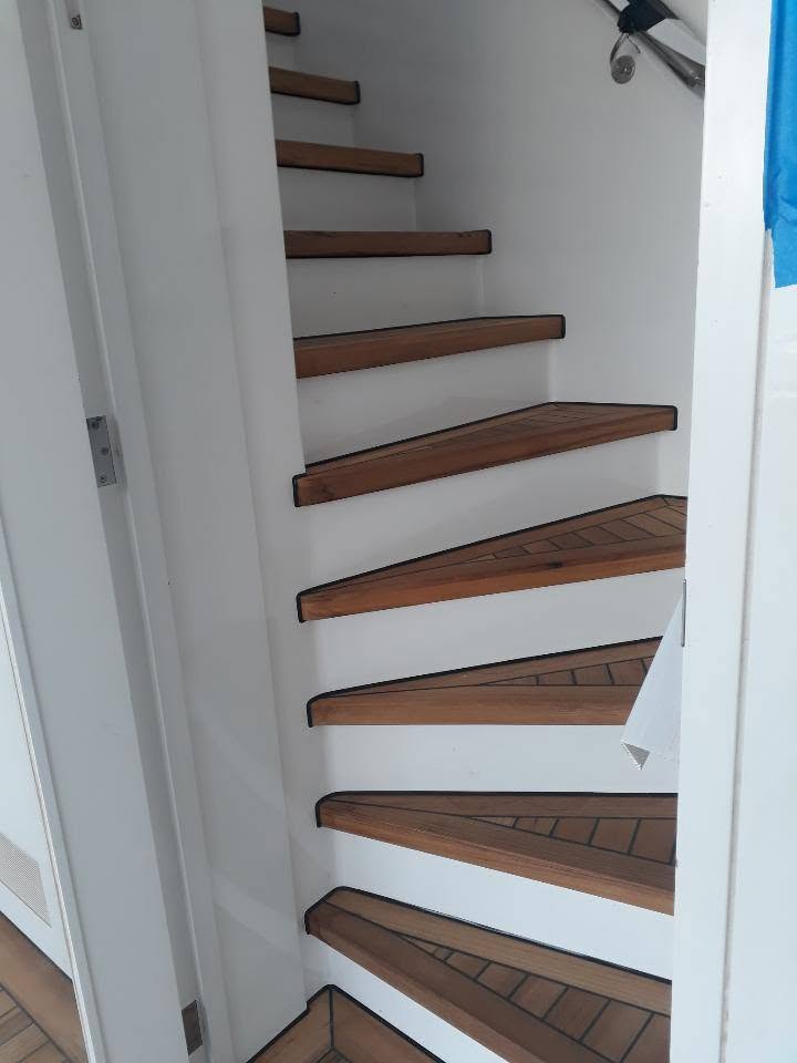 Spiral teak companionway