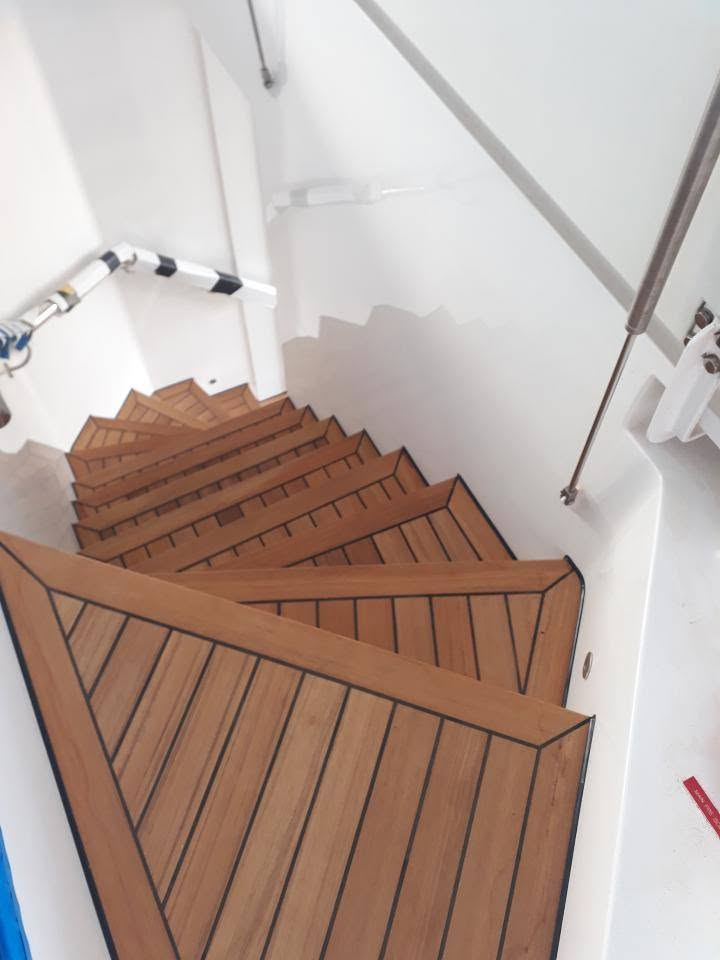 Spiral teak companionway