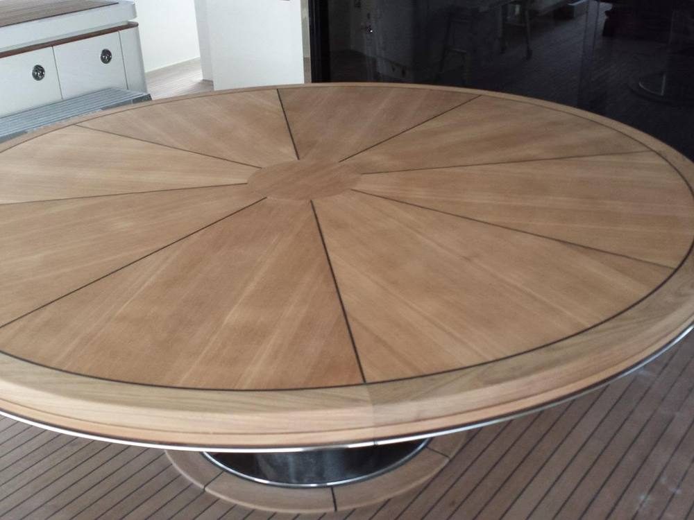 Radial sunburst teak table