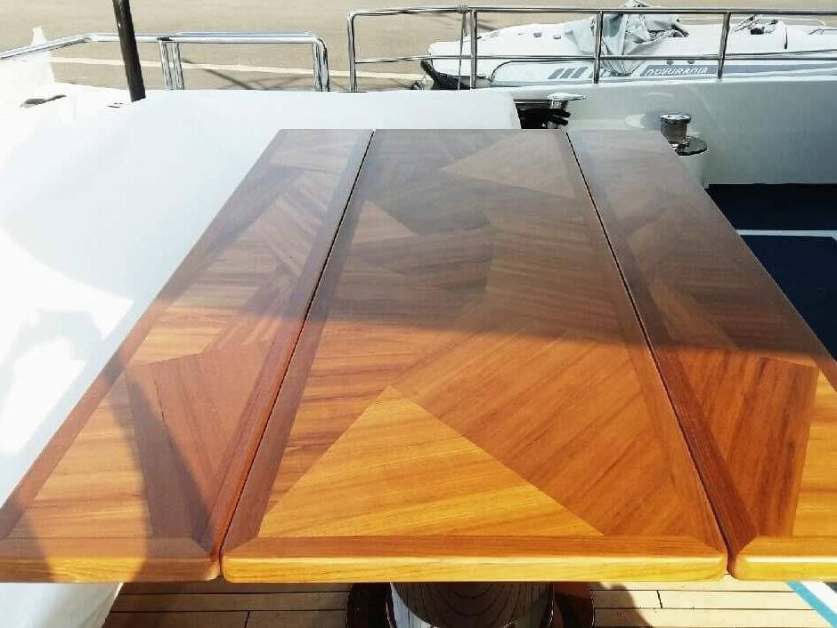 Extending marquetry deck table