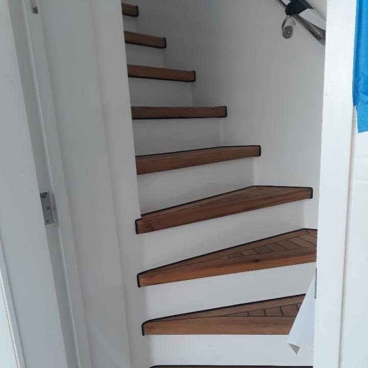 Spiral teak companionway
