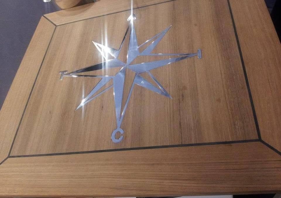 Cockpit table with compass rose inlay