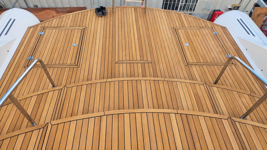 After — 60 m² teak deck rebuilt from scratch, Saint-Martin