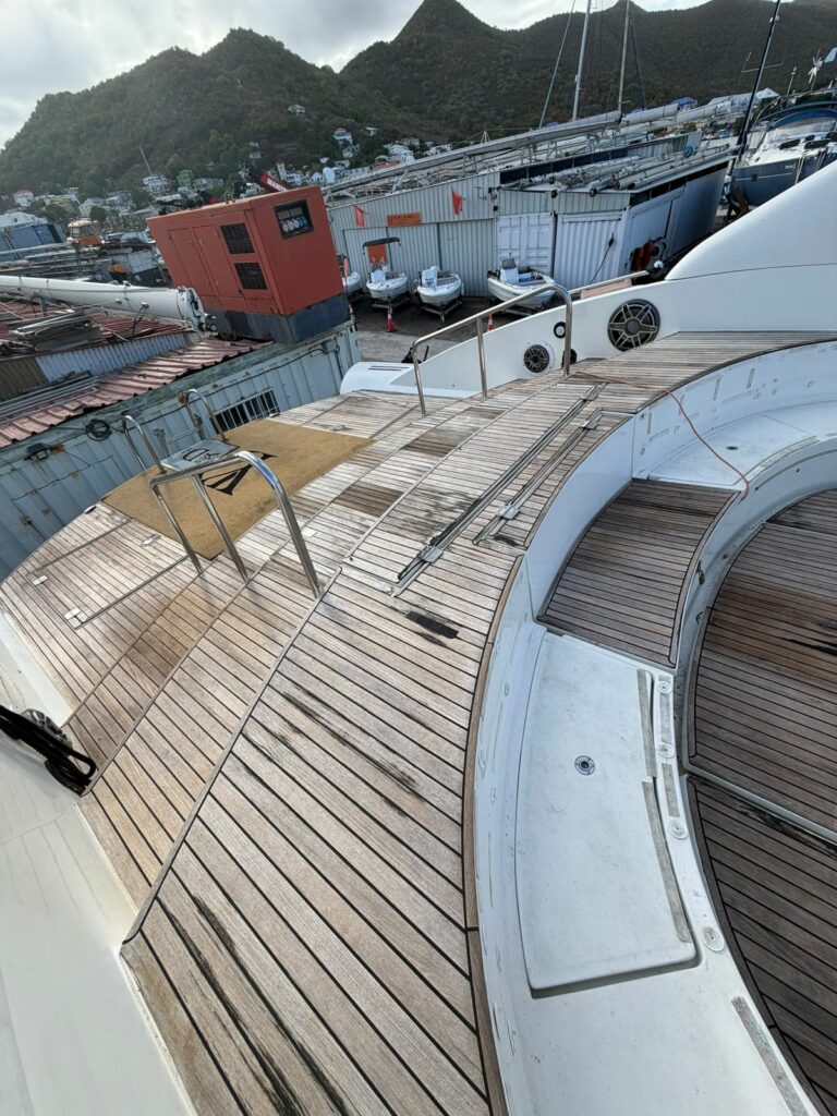 Before — 60 m² teak deck rebuilt from scratch, Saint-Martin